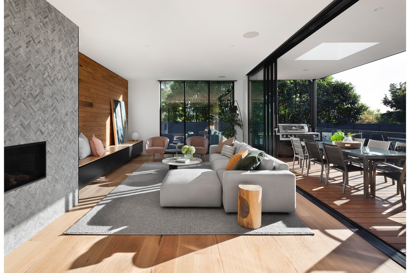 gray sectional couch beside brown wooden table